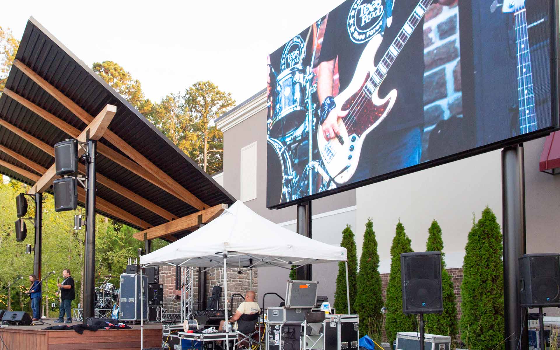 Outdoor stage and LED screen at Peachtree Corners Town Green